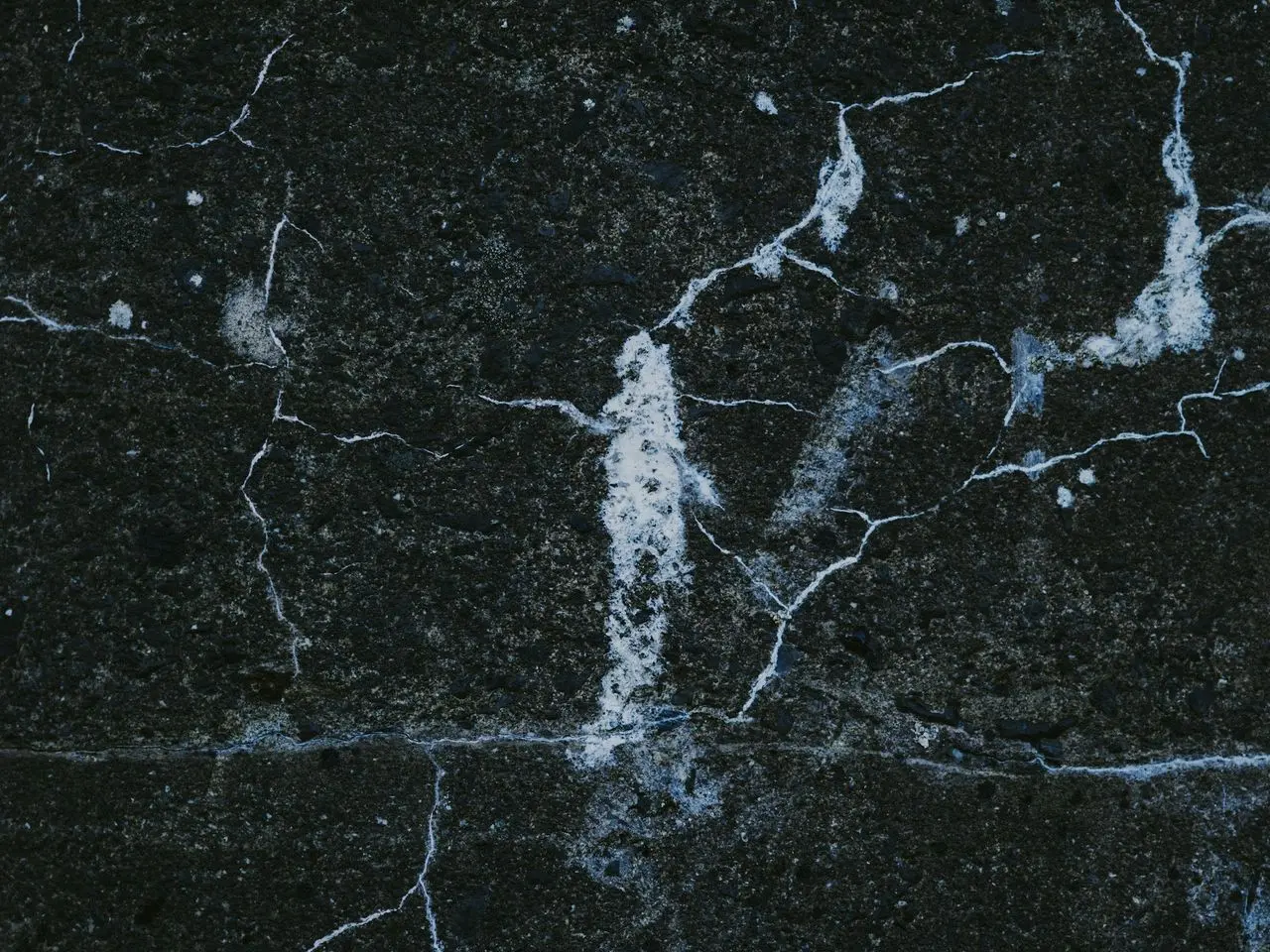 a close up of a black marble surface